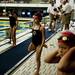 Milan swimmer Kendal Sanders stretches before competing in the 8 & under 50-meter breaststroke on Monday, July 29. She won her heat. Daniel Brenner I AnnArbor.com